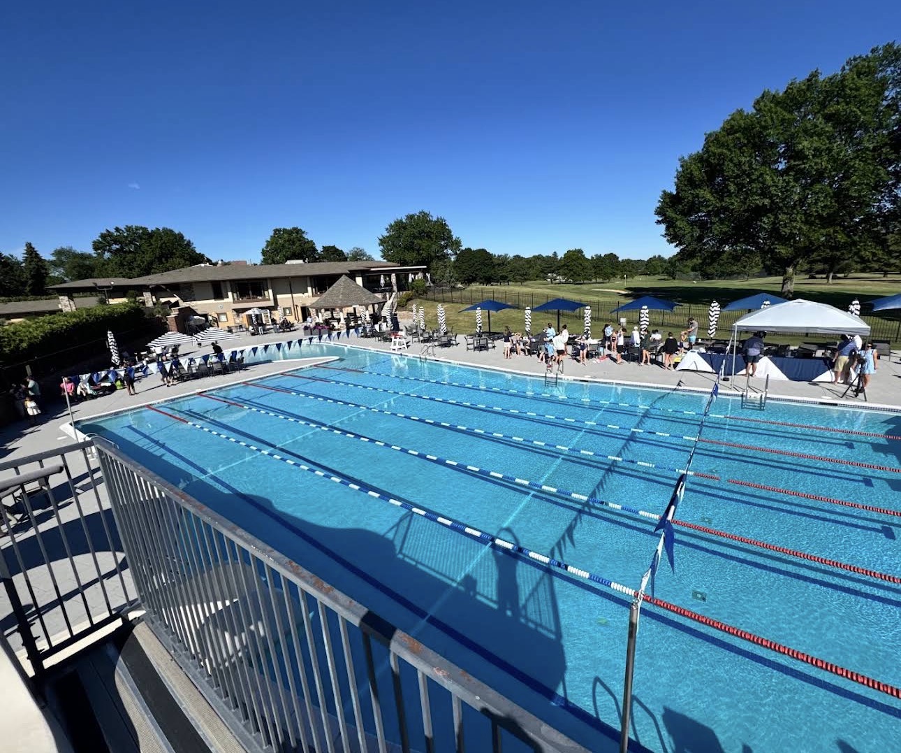 Country club pool with lane lines on a sunny day